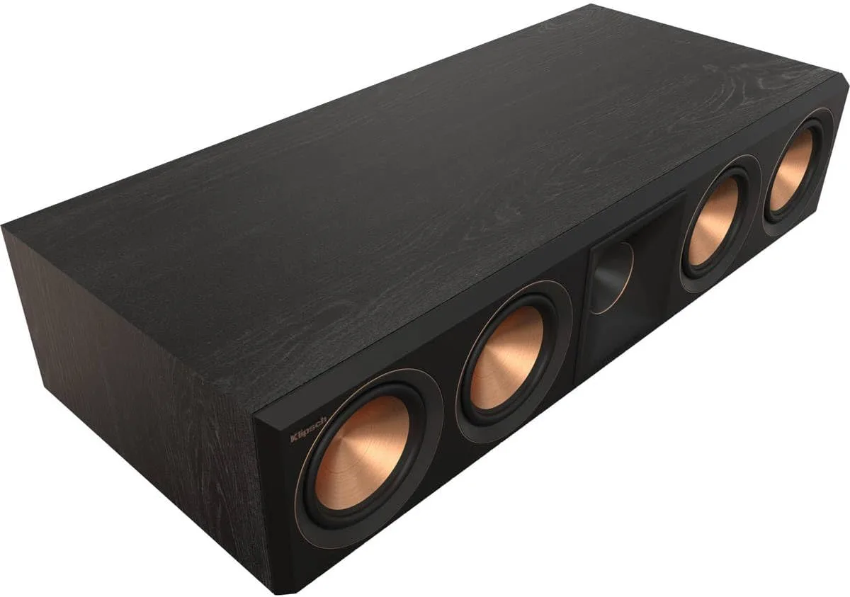 Klipsch RP-504C II center channel speaker in Ebony finish, grille off, showing four copper-spun 5.25-inch Cerametallic woofers flanking a Tractrix horn-loaded tweeter