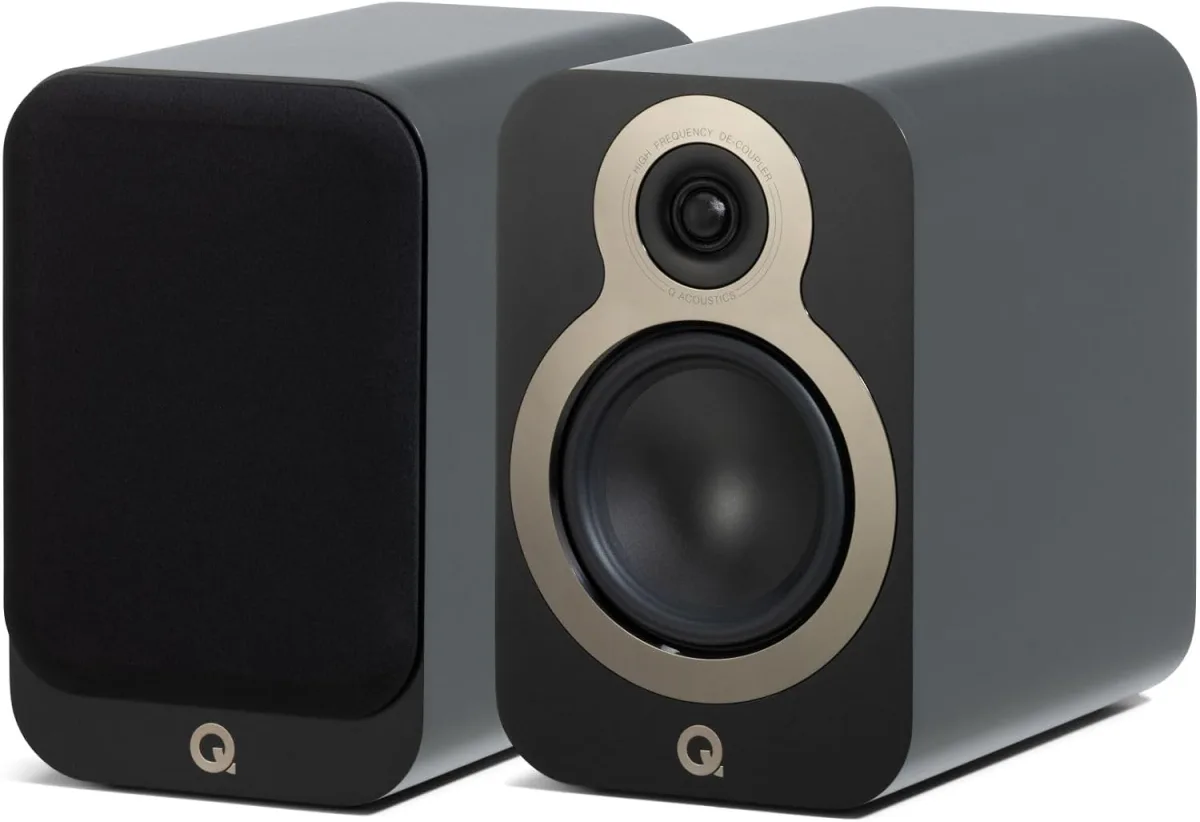 Q Acoustics 3030c bookshelf speaker pair in satin black, grilles off, shown at a three-quarter angle on a white background